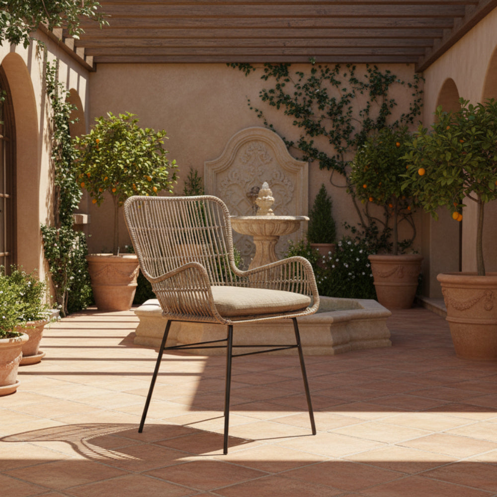 Wicker chair with metal legs on a white background