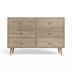 A Scandinavian-style dresser with six drawers, featuring a premium textured melamine finish, rustic pine legs, and round handles.