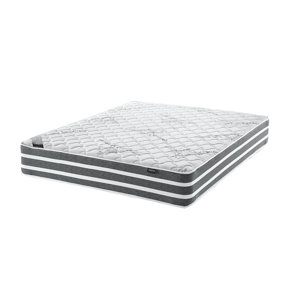A firm queen-sized mattress with extra length, featuring a white and gray color pattern on the top surface.