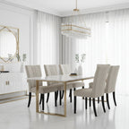 Beige upholstered chair with quilted backrest on a white background
