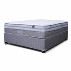 Gray mattress with a visible brand logo on a white background