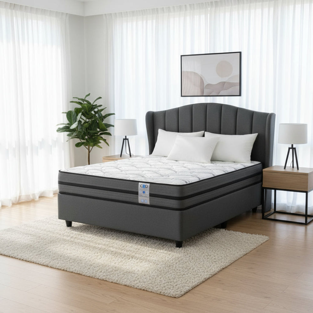 Mattress with control panel on a white background