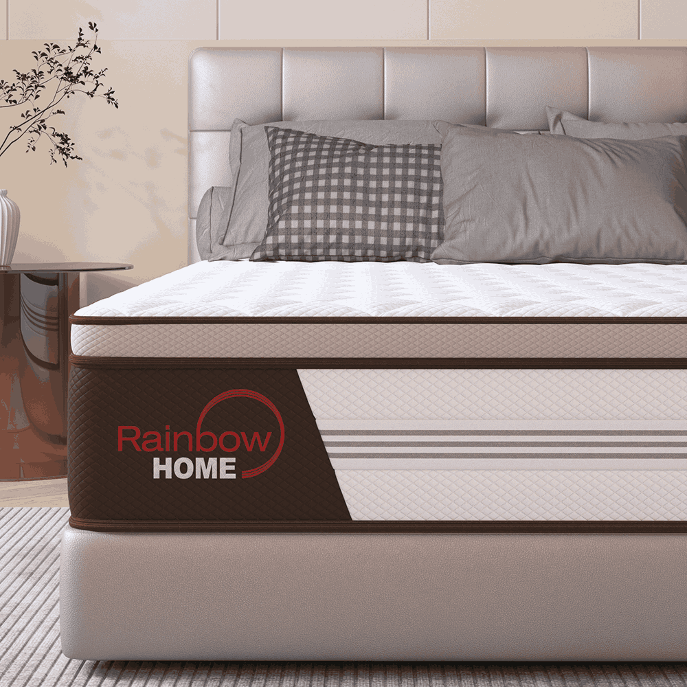 Mattress with Rainbow Home branding on a bed in a bedroom setting