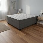 Gray mattress with a textured surface on a white background