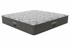 Gray mattress with 'Restonic' branding on a white background