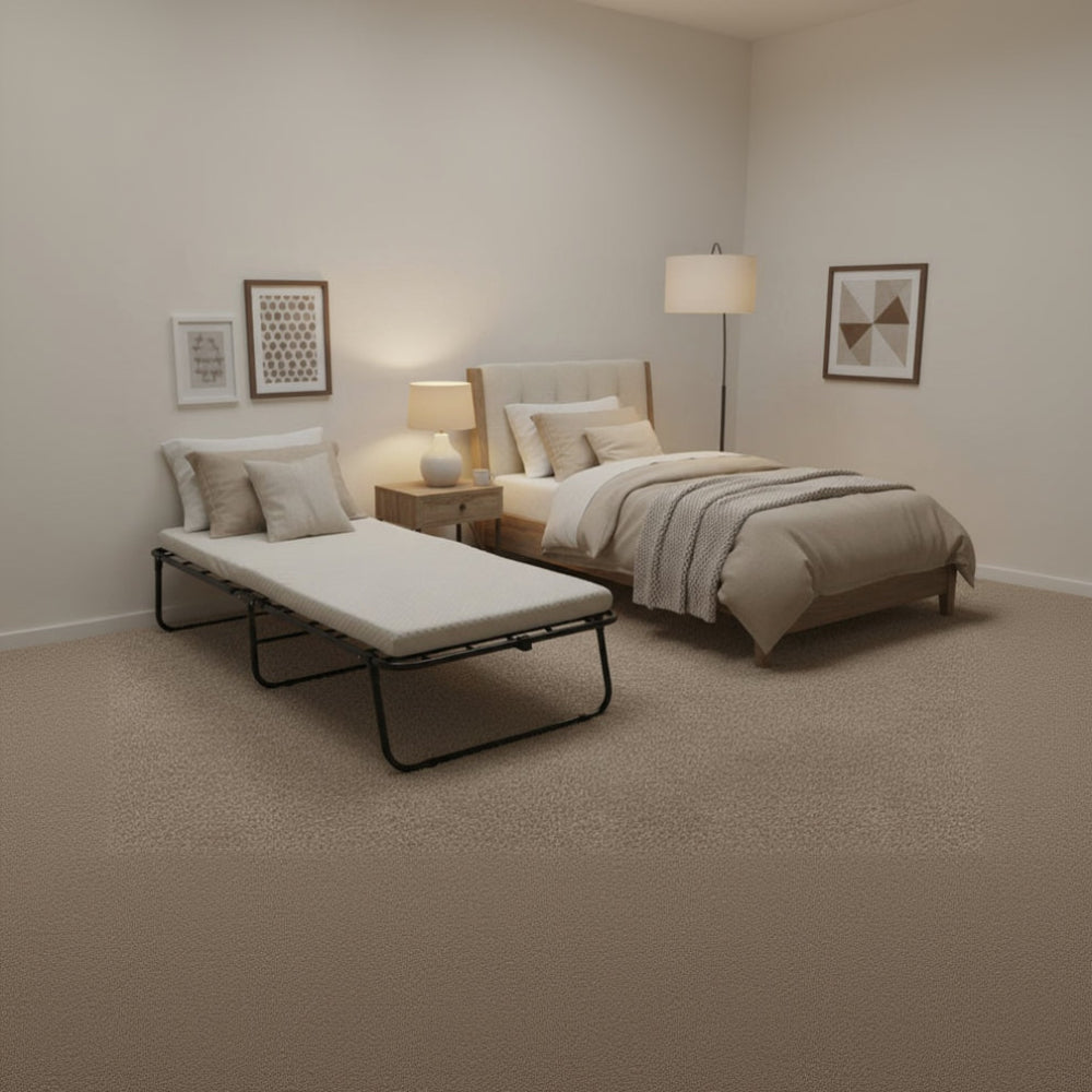 Foldable bed with a mattress on a white background
