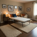 Foldable bed with a mattress on a white background