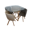 Dining table with four chairs on a white background