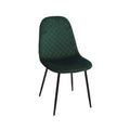 Green chair with quilted backrest on a white background