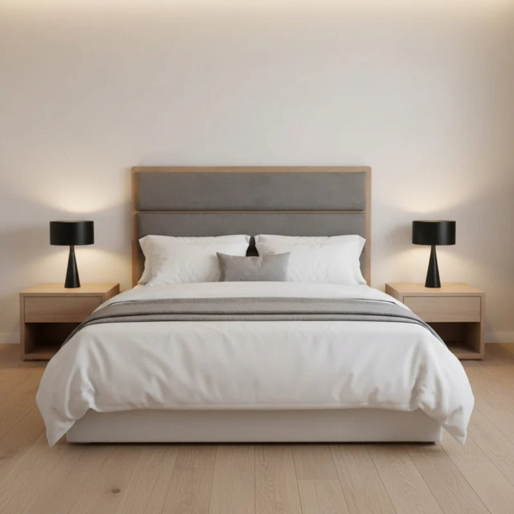 Modern bedroom with a bed, nightstands, and lamps.