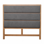 Gray upholstered headboard with wooden frame on a white background