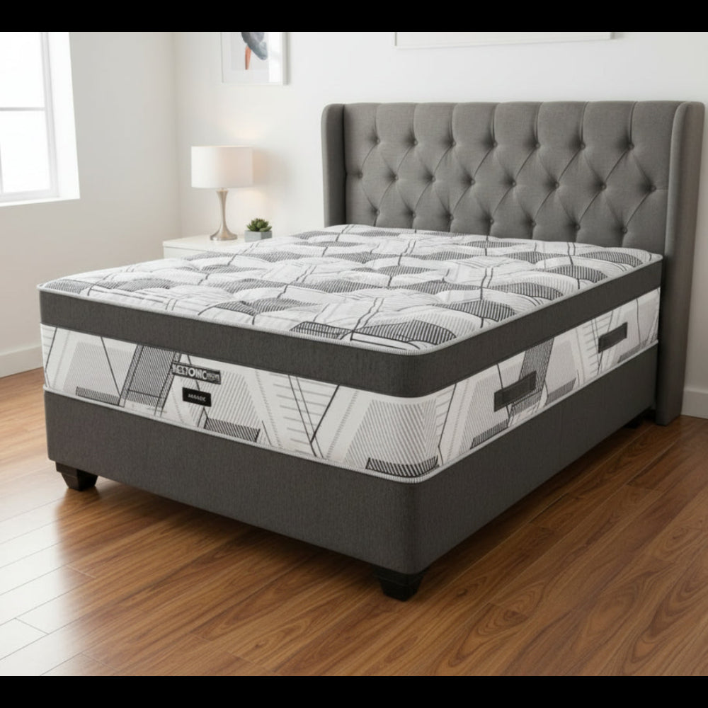 Gray and white mattress with geometric pattern on a white background
