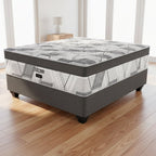 Gray and white mattress with a geometric pattern on a white background