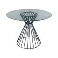 Round glass table with black wire base on a white background