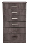 Wooden dresser with five drawers on a white background