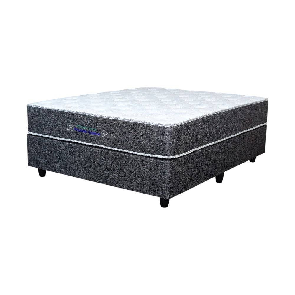 Gray mattress with a visible brand logo on a white background
